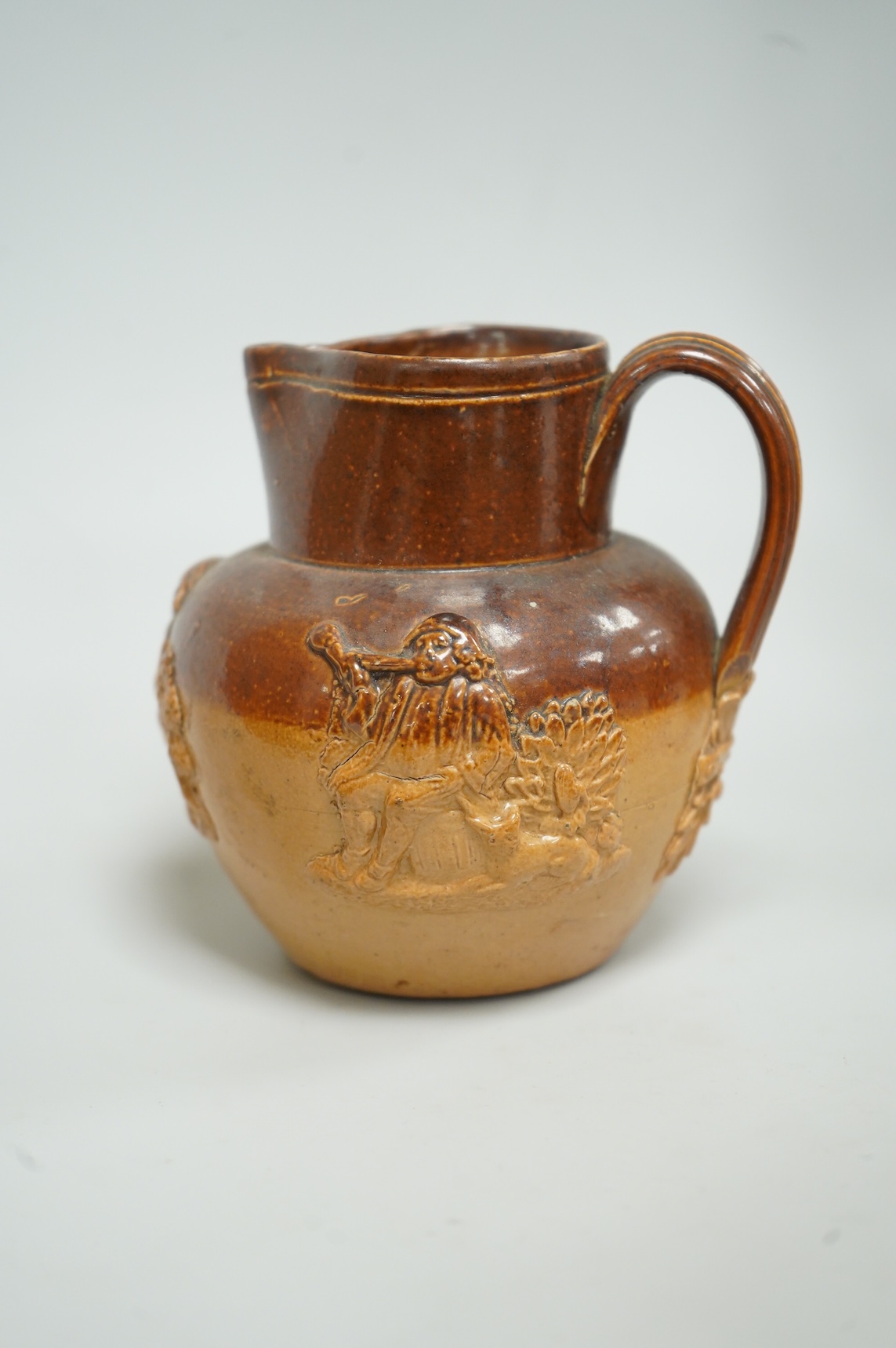 A pair of Royal Doulton Slater’s patent vases, 26cm high and pots and a jug together with a collection of miniature stoneware pots jugs and a pair of peppers